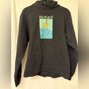 Black Hoodie with Piccichu Graphic Print. Size large.